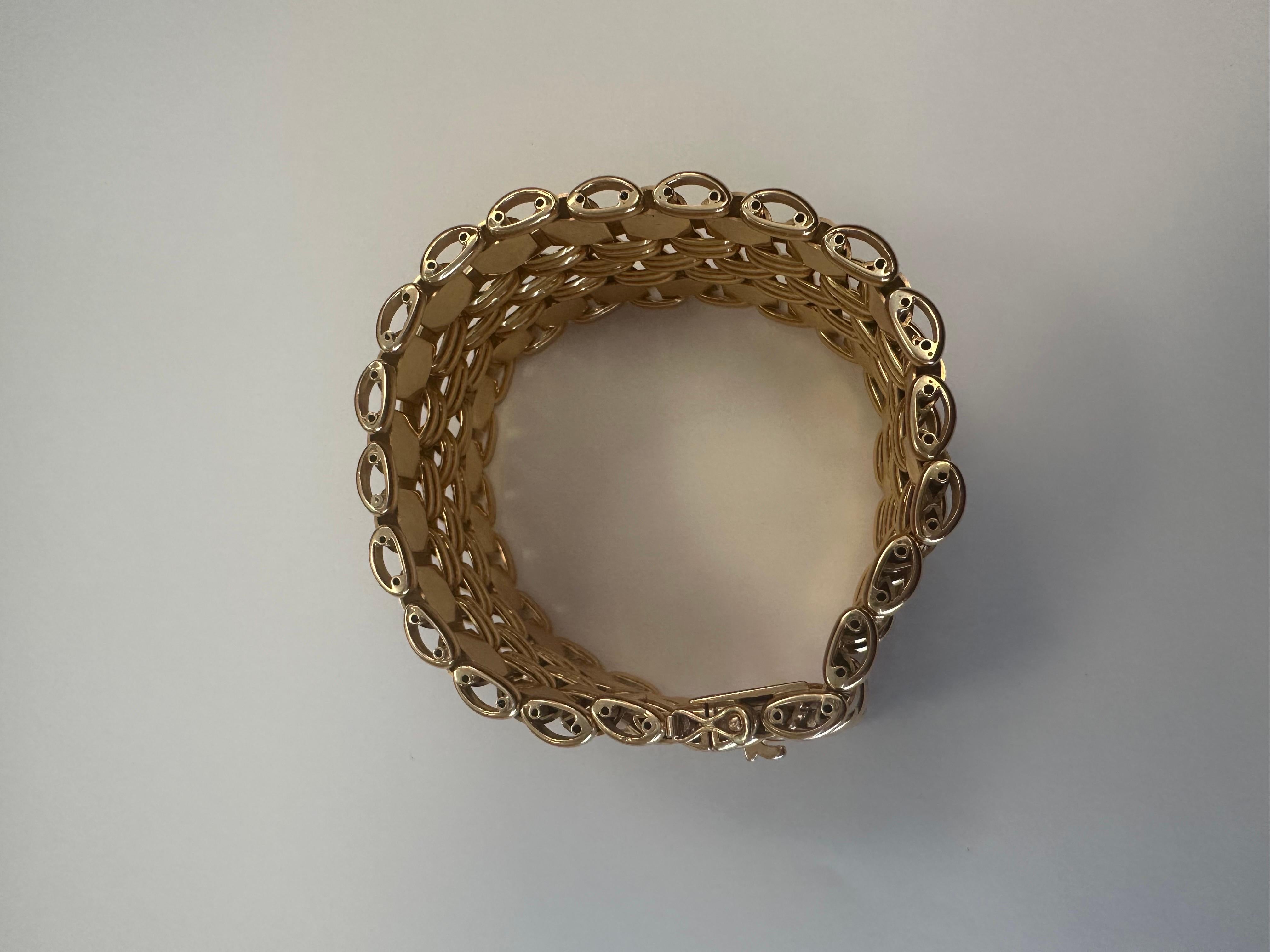Lady's 18K rose gold flexible link bracelet, 7.25 inches long and 1.25 inches wide, weighing 132.3 grams, circa 1940.
