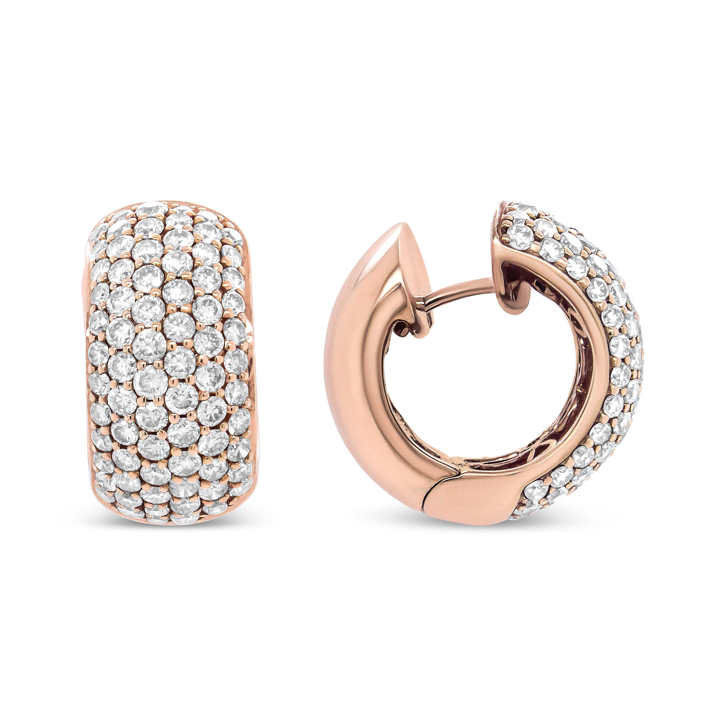 Crafted of genuine 18k rose gold, these hoop earrings show off the brilliance of 148 diamonds with a total 3 1/8 cttw and an approximate J-K Color and VS1-VS2 Clarity. These classic hoops show off an updated domed silhouette with prong-set round