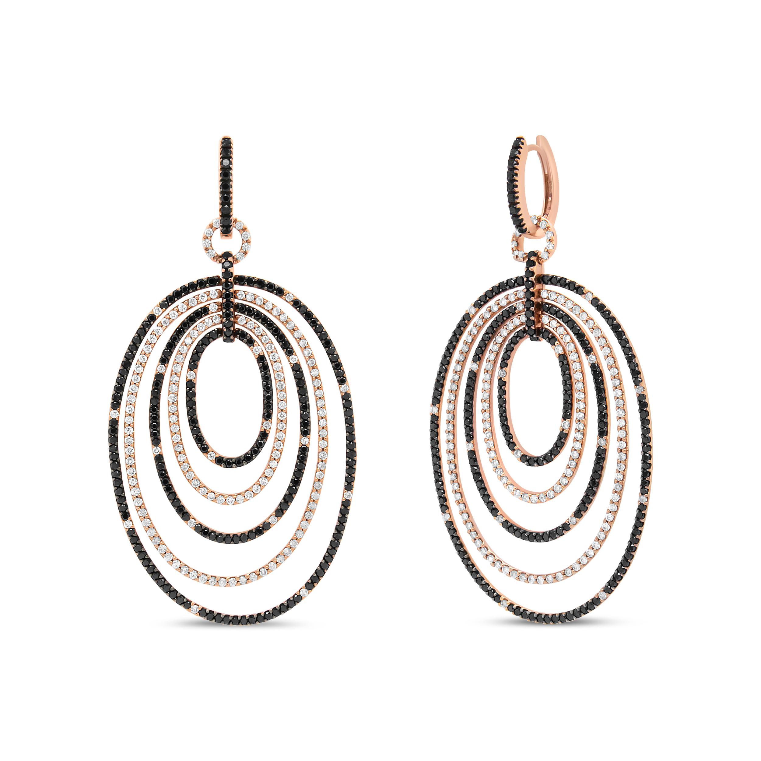 The fearless and bold design of these 18k rose gold earrings make it the eye-catcher it is. Heightened with the allure of 710 round, prong-set diamonds, this pair is nothing short of dazzling! A total of 5 hoops in graduated sizes features an