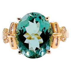 Anillo de turmalina verde de oro rosa de 18 quilates y 6,75 quilates de diamantes
