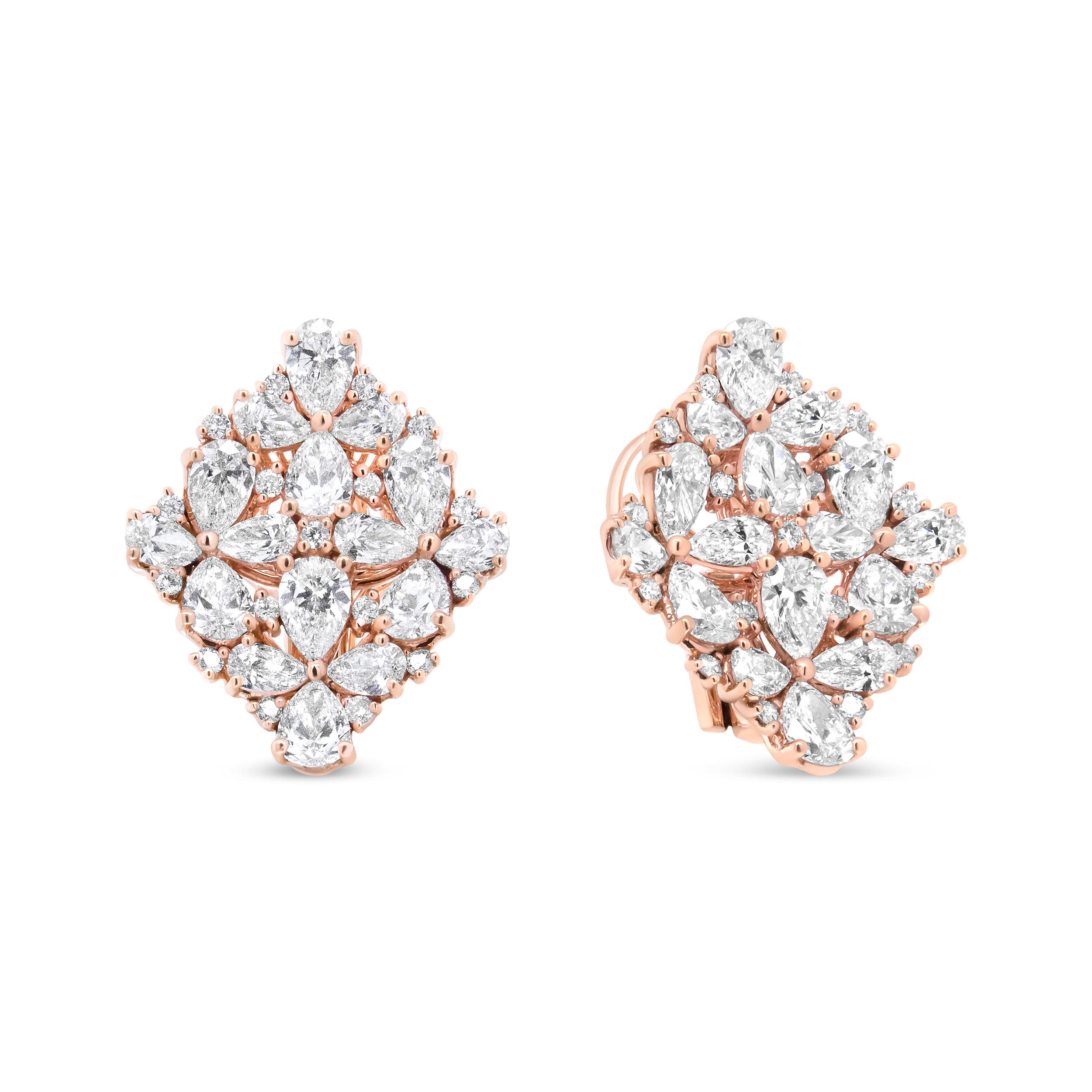 These bold earrings dazzle with a wow-factor like none other! A shimmering collection of diamonds sparkle from all over the face  of these marquise-shaped earrings. Glittering pear-shaped diamonds act as the petals in this floral motif, each set in