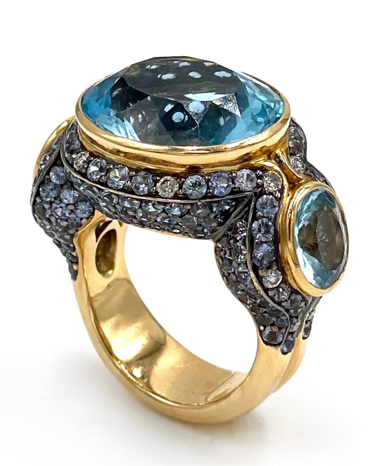Oval Cut 18k Rose Gold and 21.34 Carat Blue Topaz Statement Ring For Sale