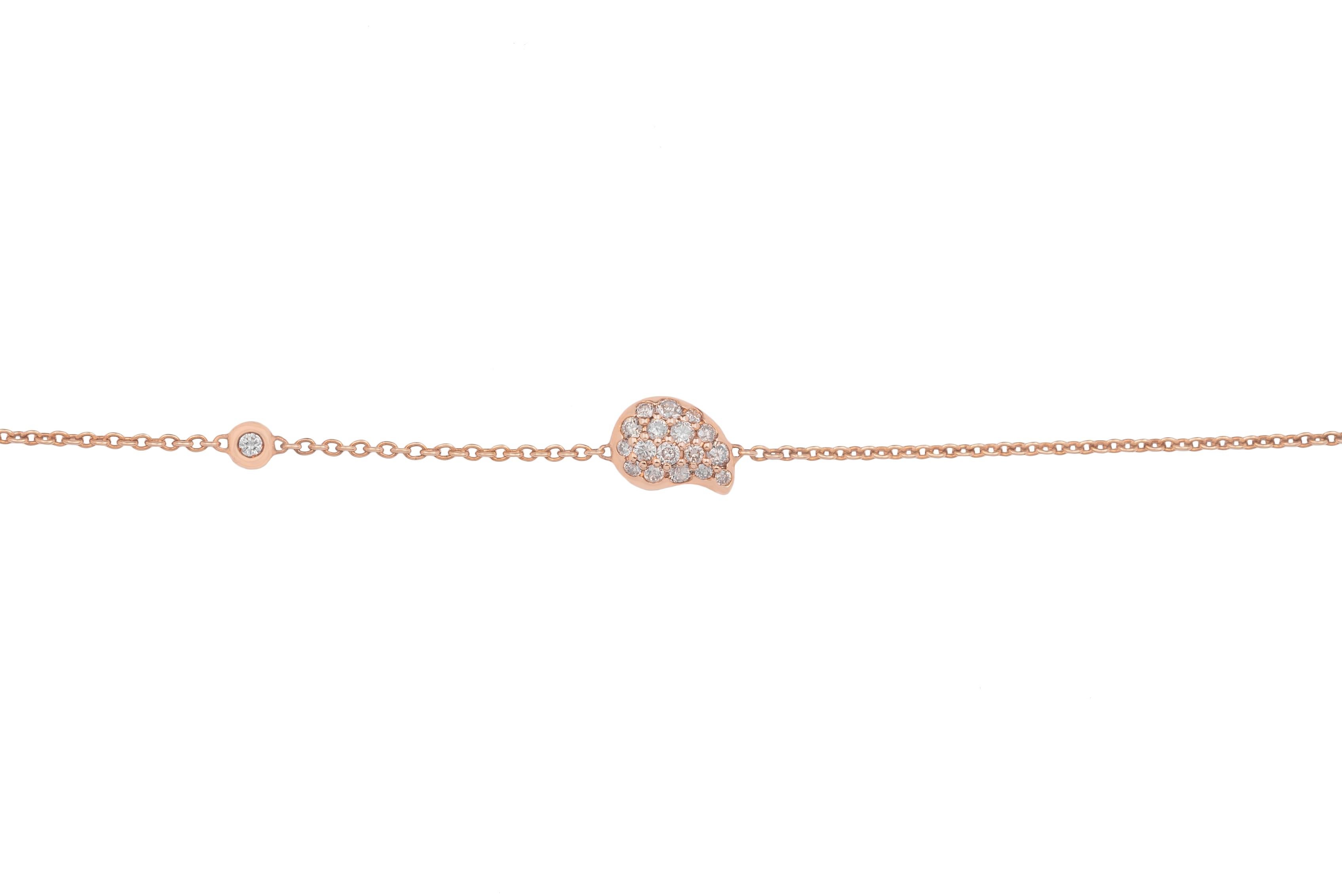 This 18k rose gold bracelet with brown diamonds is made in Italy by Fanuele Gioielli.    
A rose gold drop with brilliant cut brown diamonds is at the centre of the bracelet, followed by a white diamond.
The length of the bracelet can be adjusted