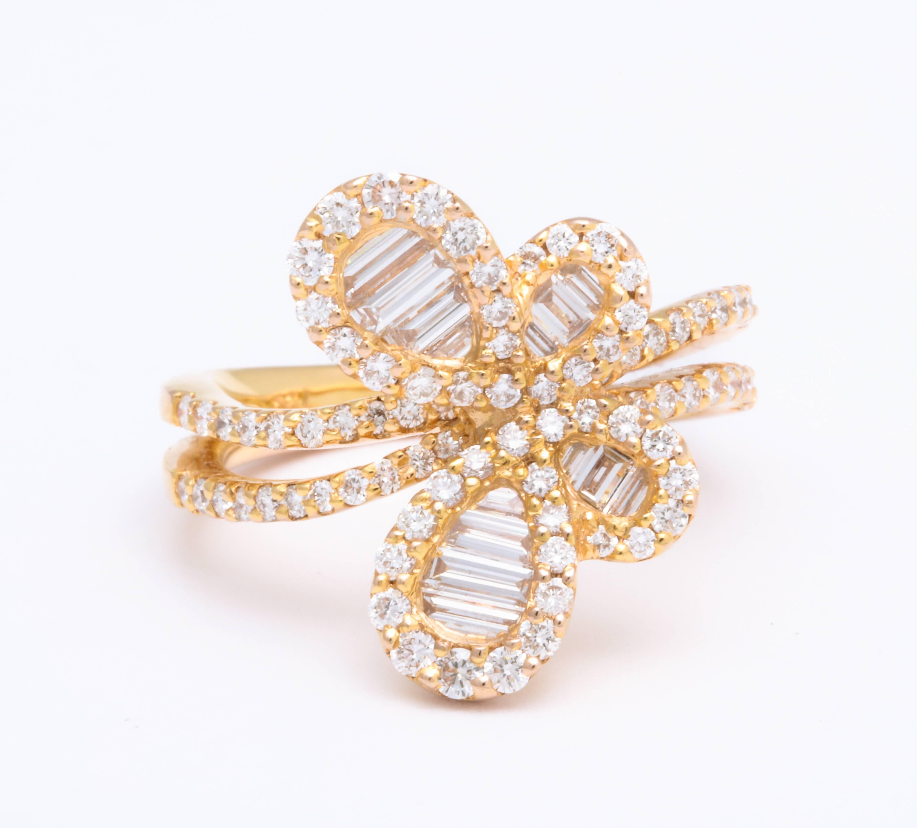 It's all in the details! This beautiful 18 Karat rose gold butterfly ring is decorated with precision-cut baguette diamond wings, round brilliant-cut diamond trim, and double-shank ring: 1.52 carats combined weight. Made to fit a 6.5 finger size but