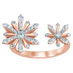 Anello aperto in oro rosa 18k e diamanti con due fiori di stella alpina