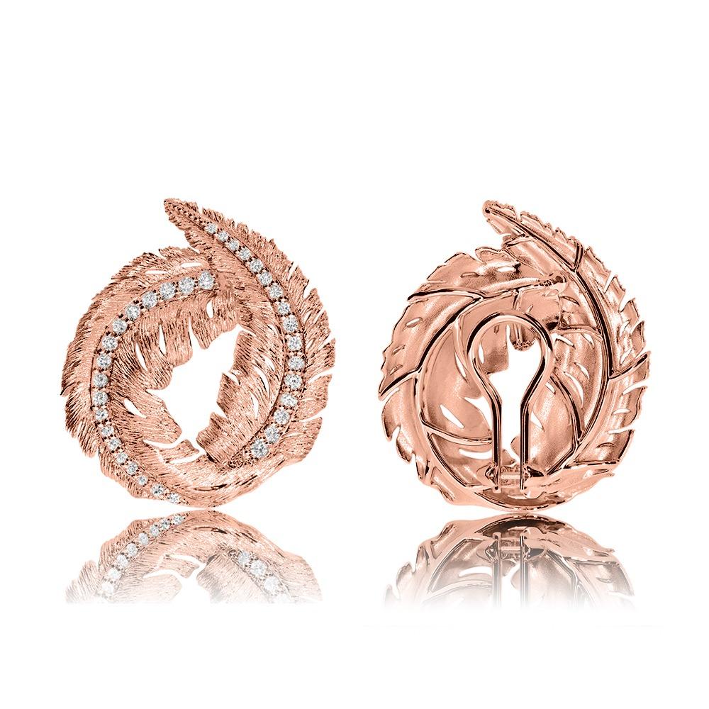 The leaf collection is a beautiful tribute to nature. It features a hand textured finish mirroring the details of the venation of a leaf with diamonds carefully set along the midrib to give a very high end and elegant look in 18K Rose Gold and