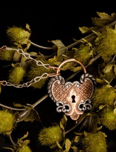 18 Karat Rose Gold Antique Padlock Necklace with 0.66 Carat White Diamonds