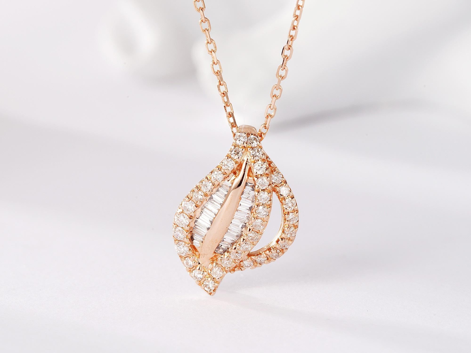 Collana con ciondolo a foglia di diamante Baguette in oro rosa 18K

Diamanti Baguette - 0,06 CT
Diamanti rotondi - 0,19 CT

Peso totale - 2,13 GM
