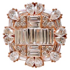 Bague en or rose 18 carats avec diamants baguettes ronds en forme de poire
