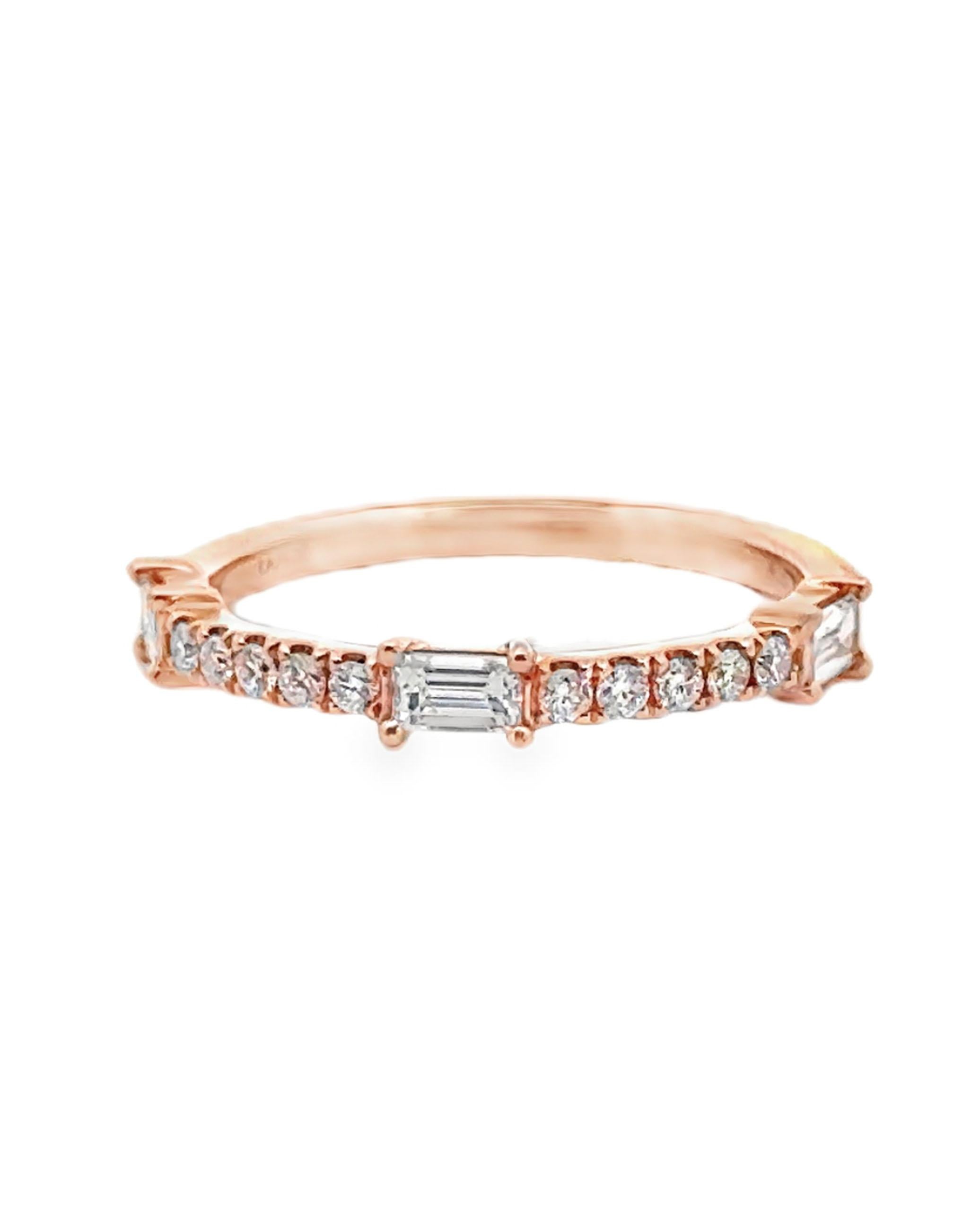 18K rose gold diamond ring with 10 round diamonds weighing 0.14 carat total and 3 baguette diamonds weighing 0.31 carat total.  

Finger size is 6.5, can be resized by up to 2 sizes up or down.
