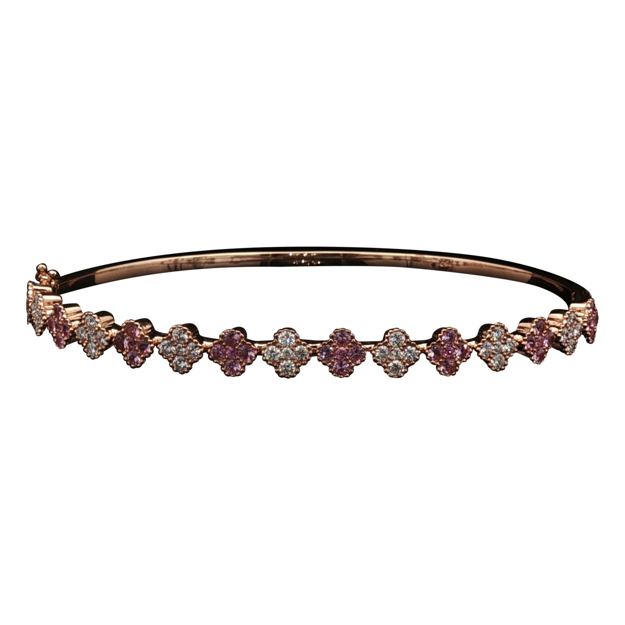 Bracelet en or rose 18 carats avec diamants et saphirs roses