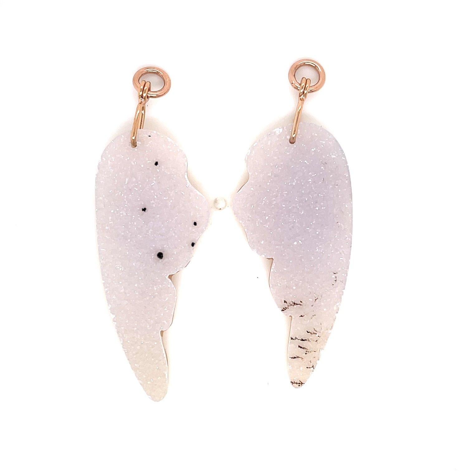 A pair of 18k rose gold bits and pieces studs, with a pair of carved white druzy wing jackets with 18k rose gold. These earrings were made and designed by llyn strong.

Items sold separately upon request.