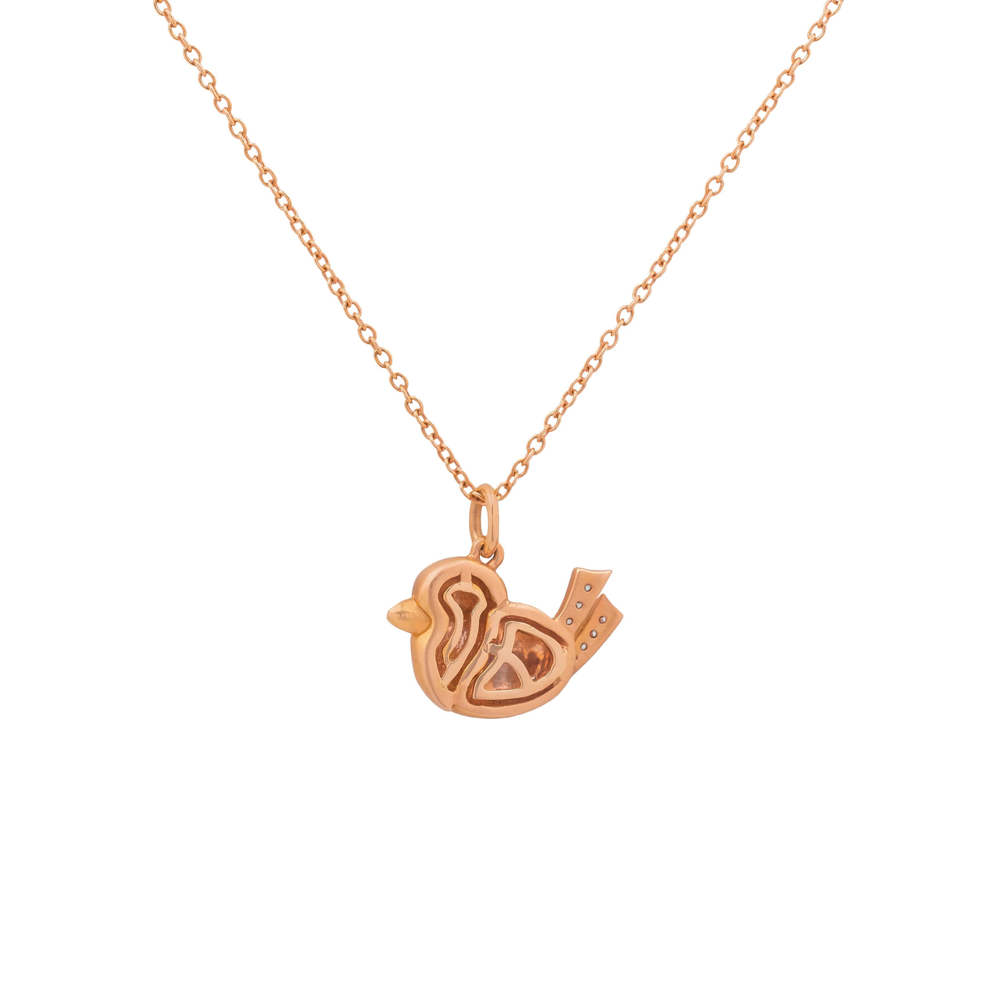 This lovely 18K rose gold necklace is made in Italy by Fanuele Gioielli. 
It features a sparrow shaped pendant with a brilliant cut black diamond on the eye and seven brilliant cut white diamonds on the tail.

Diamonds total content is 0.08 ct
18k