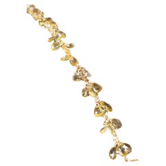 Bracelet en or rose 18 carats avec saphir orange et tourmaline