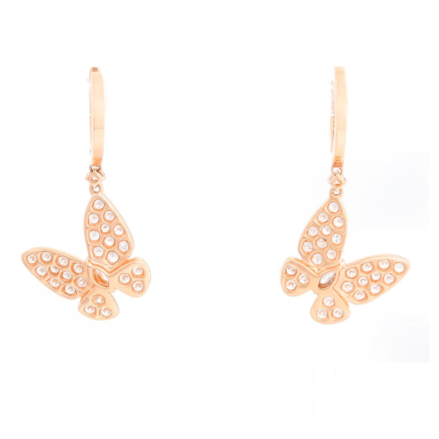 18K Rose Gold Butterfly Earrings - Unused rose gold dangle butterfly earrings. Weighing 1.40 carats of diamonds. Total weight 4.7 grams. Total length 1 inch and a half.