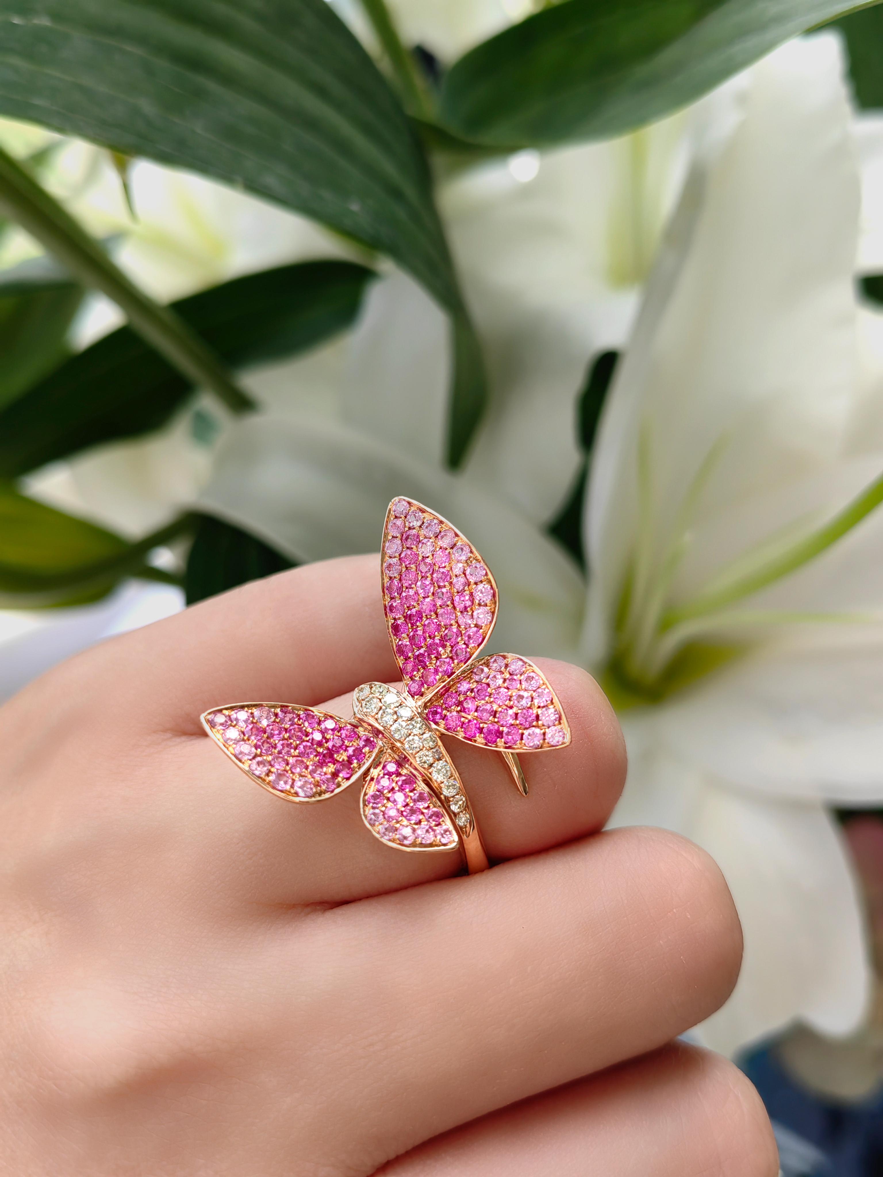 18K Rose Gold Butterfly Garden Pink Sapphire Diamond Open Cocktail Ring
US Size: 6.5

16 Colored Diamonds - 0.22 CT
109 Pink Sapphires - 2.46 CT
18K Rose Gold - 7.74 GM

109 Pink Sapphires make our butterfly ring so pretty and special. The open end