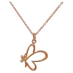 18k Rose Gold Butterfly Pendant with a White Diamond