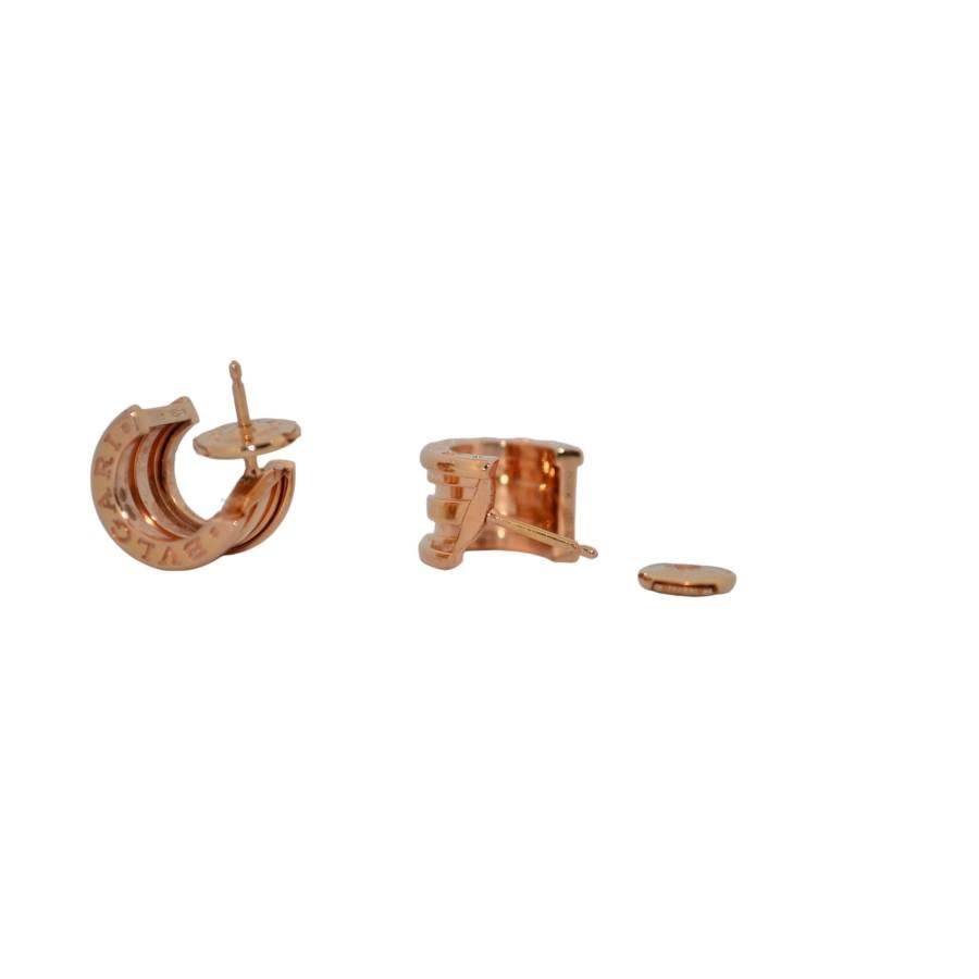 Earrings are made of 18K rose gold. The product comes with an AGS Jewelry certificate of conformity, which includes details about the metal and the precious stones used in confectioning the jewelry.  For more information about delivery, warranty and