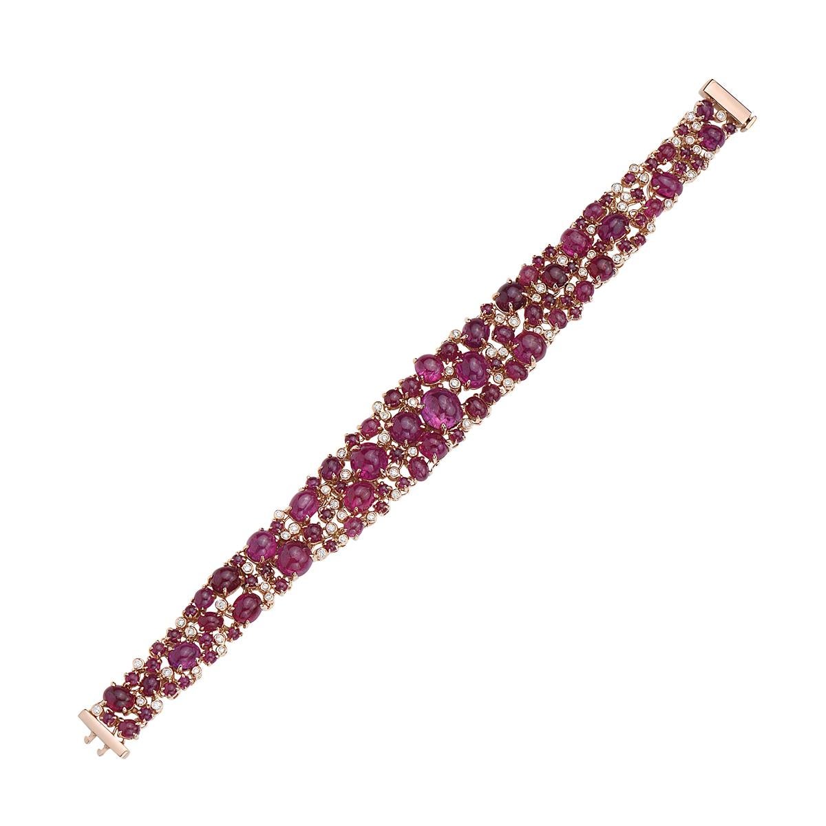 This bracelet features 54.65 carats of Cabochon ruby weighing 49.4 grams and 0.82 carats of diamonds set in 18K rose gold. Double prong closure. 7.5 inches long.

Viewings available in our NYC showroom by appointment.