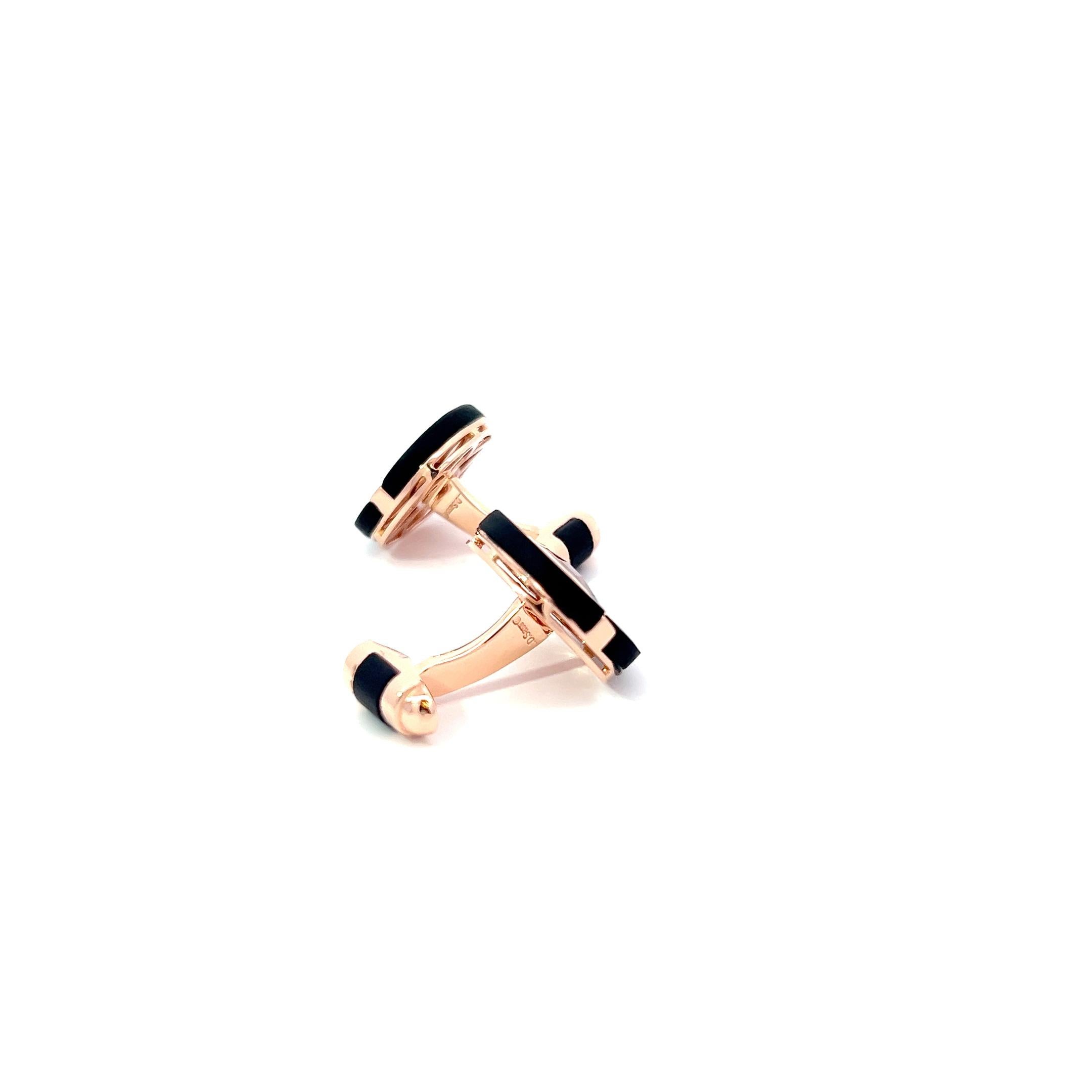 Introducing a luxurious statement piece for the discerning gentleman: these exquisite 18k rose gold cufflinks epitomize sophistication and refinement. Crafted with meticulous attention to detail, each cufflink features a captivating centerpiece of