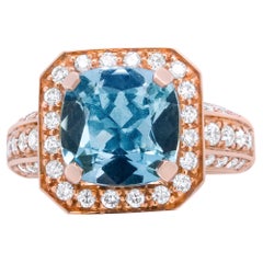 18K Rose Gold Cushion Shaped Aquamarine and 1 1/8 Carat Round Diamond Halo Ring