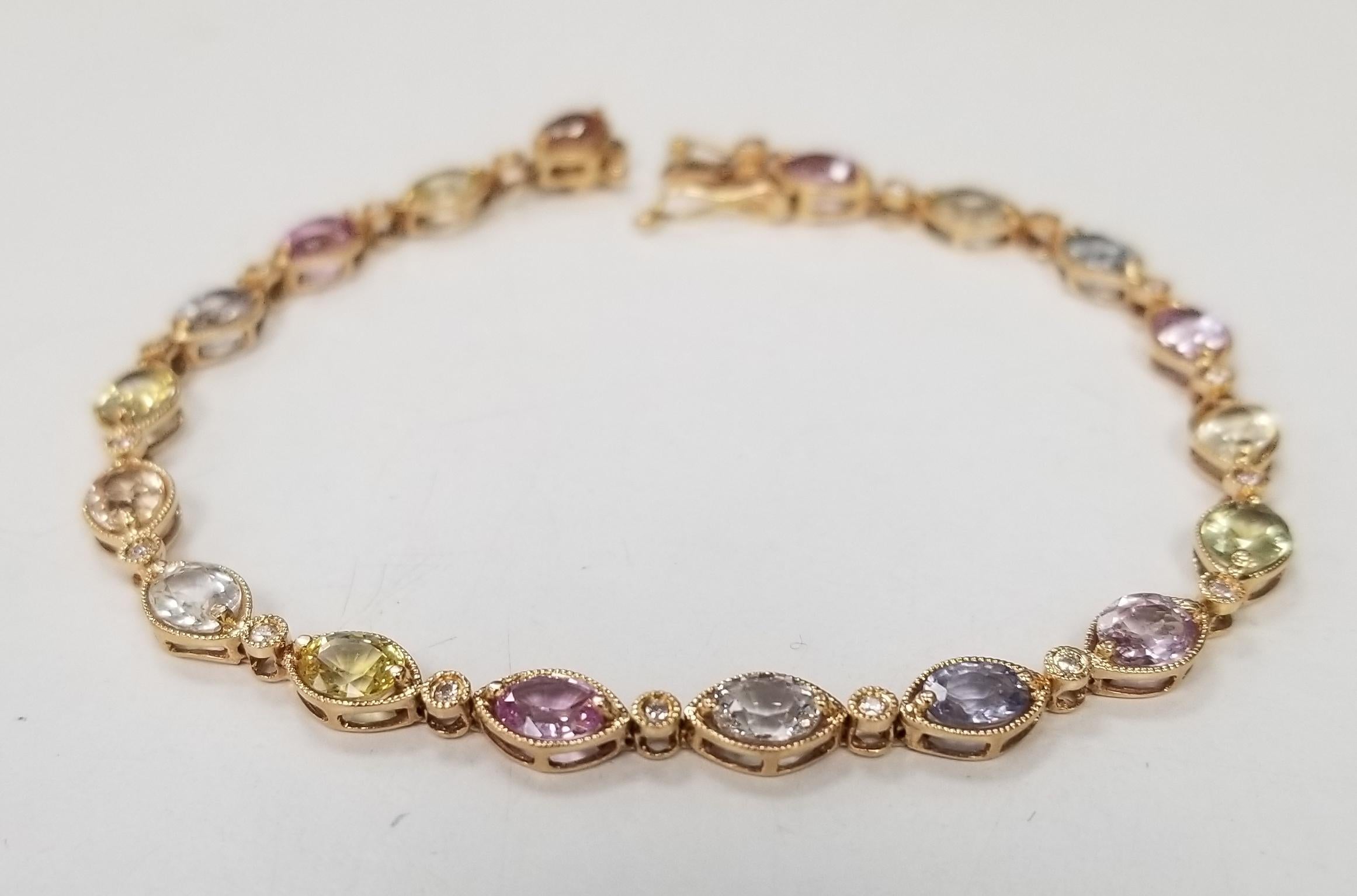 About
Beautiful 18K rose gold custom made bracelet with 18 oval multi color sapphires  and 18 pieces of round cut diamonds in  0.25 carat total weight. 
Specifications:
    main stone: MULTI-COLOR SAPPHIRES 9.05CTS.
    additional: ROUND CUT
