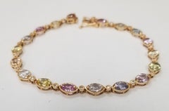 18 Karat Gold Custom Made Bracelet with 18 Multi-Color Sapphires and Diamonds