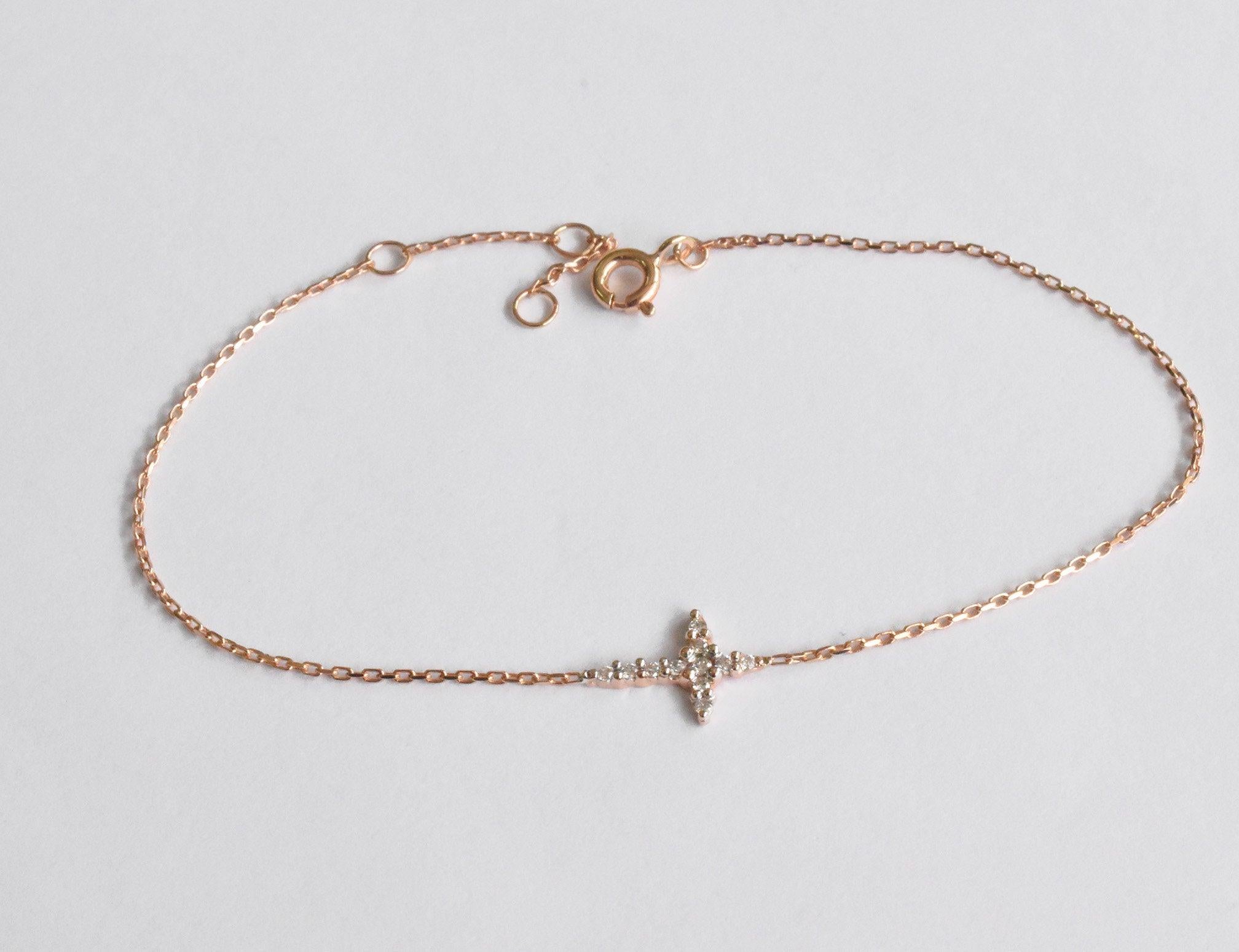 Dainty Cross Bracelet is made of 18k solid gold.
Available in three colors of gold: White Gold / Rose Gold / Yellow Gold.

Natural genuine round cut diamond each diamond is hand selected by me to ensure quality and set by a master setter in our