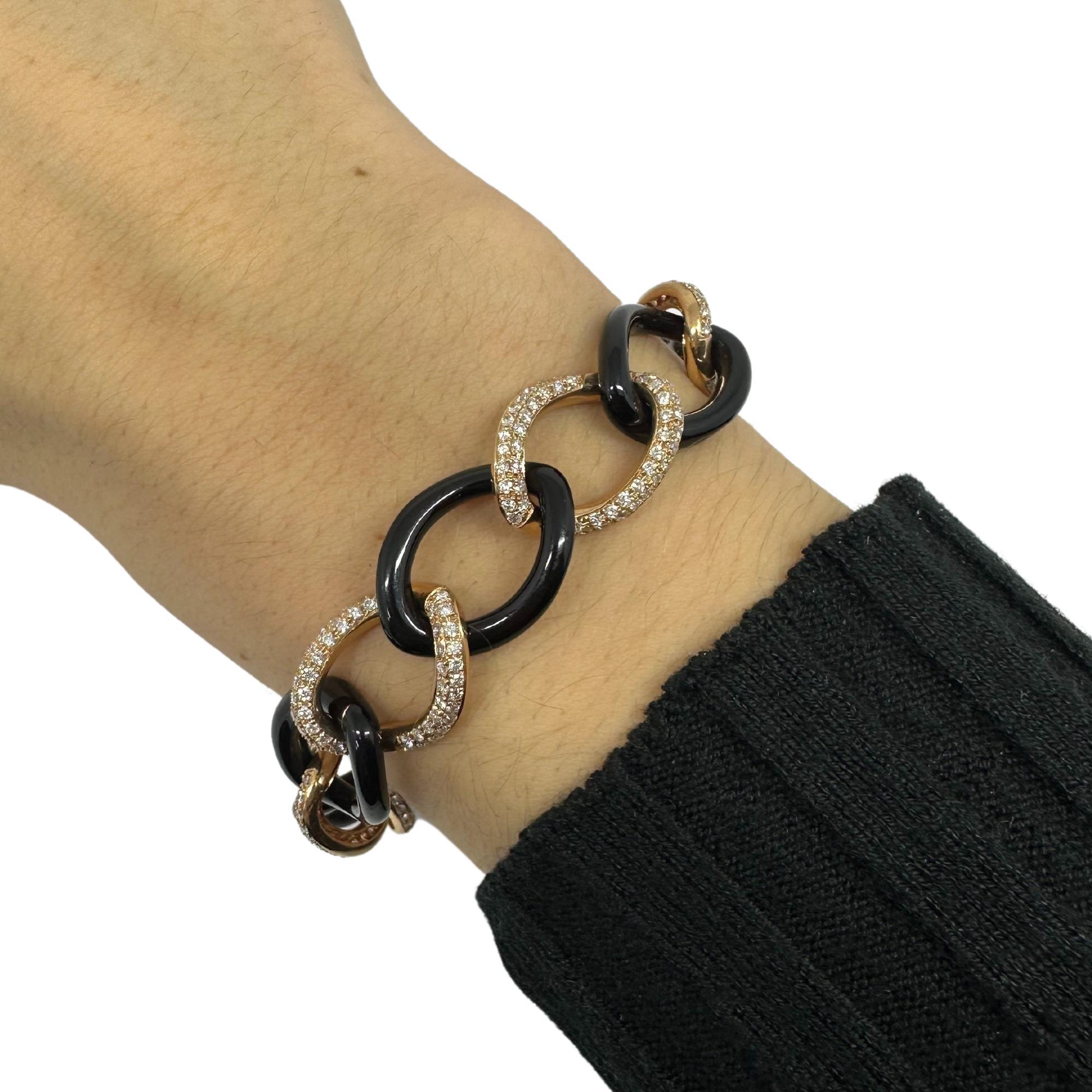 Gliederarmband aus 18 Karat Roségold mit Diamanten und Onyx (Rundschliff)