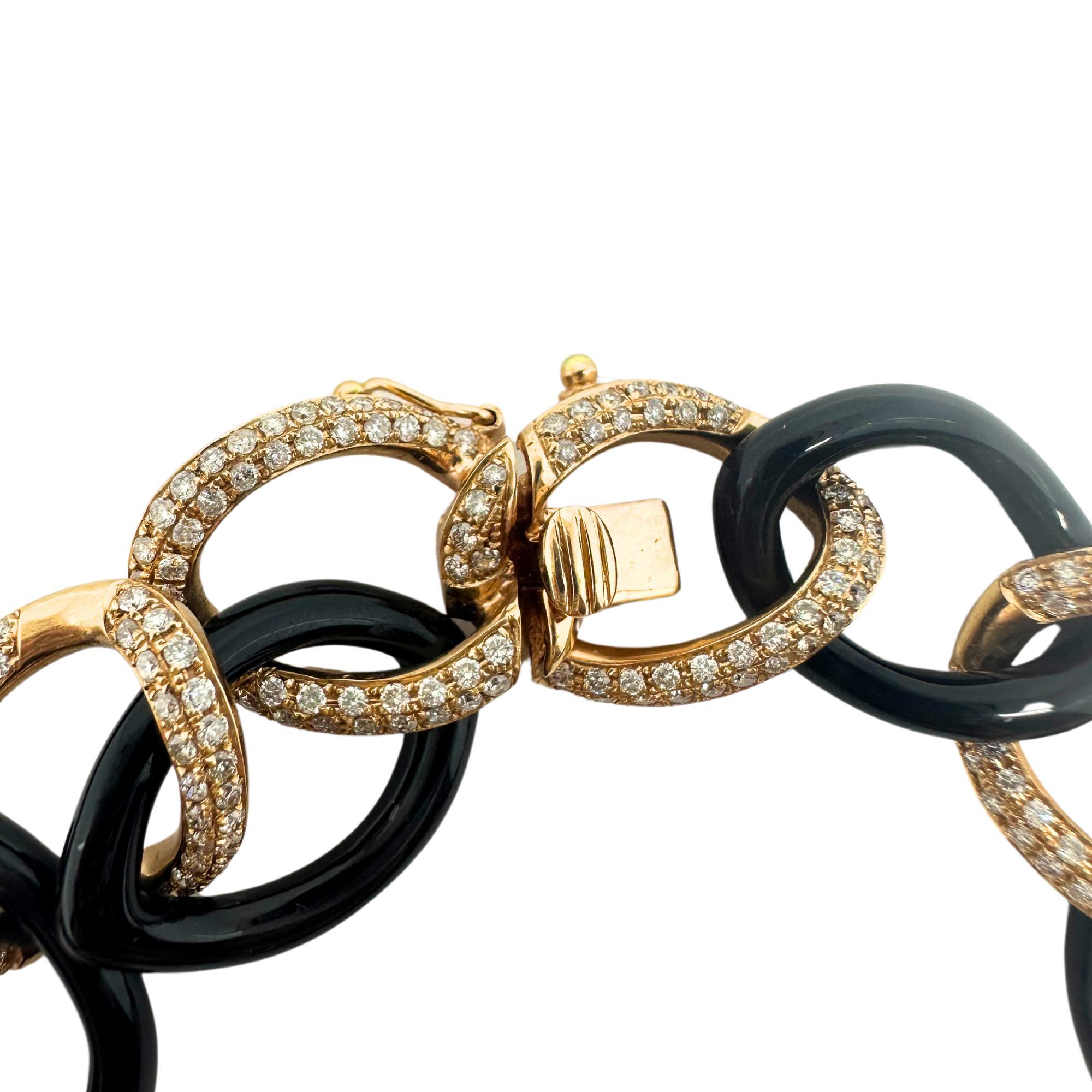 Gliederarmband aus 18 Karat Roségold mit Diamanten und Onyx im Zustand „Gut“ in New York, NY