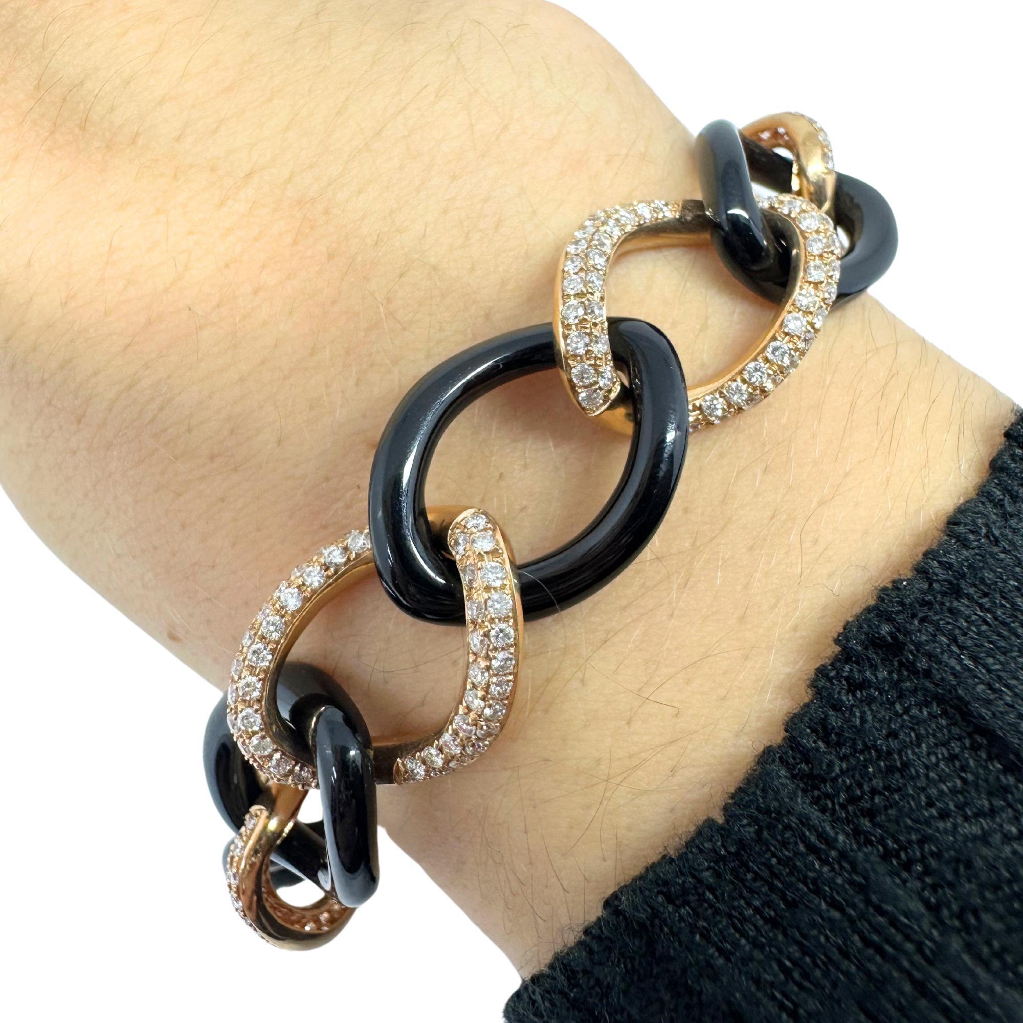 Gliederarmband aus 18 Karat Roségold mit Diamanten und Onyx 2