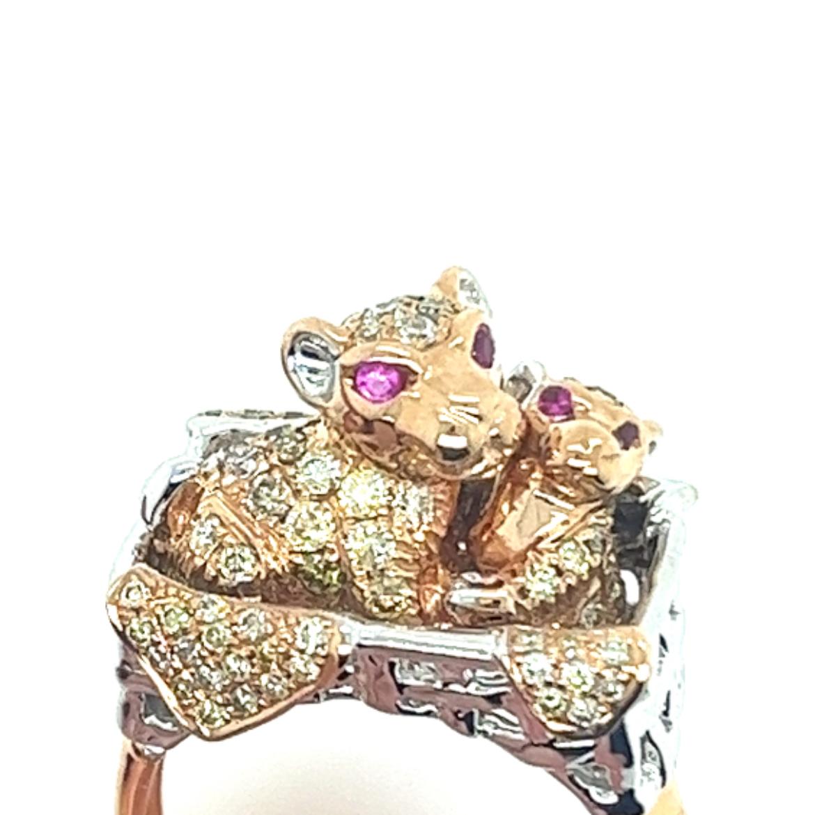 18K Rose Gold Diamond Baby Leopard Ring

113 Diamonds - 1.05 CT
4 Rubies - 0.05 CT
18K Rose Gold - 10.23 GM

This exquisite ring captures the beauty and grace of nature with its captivating design. Crafted in 18K rose gold, the band features a