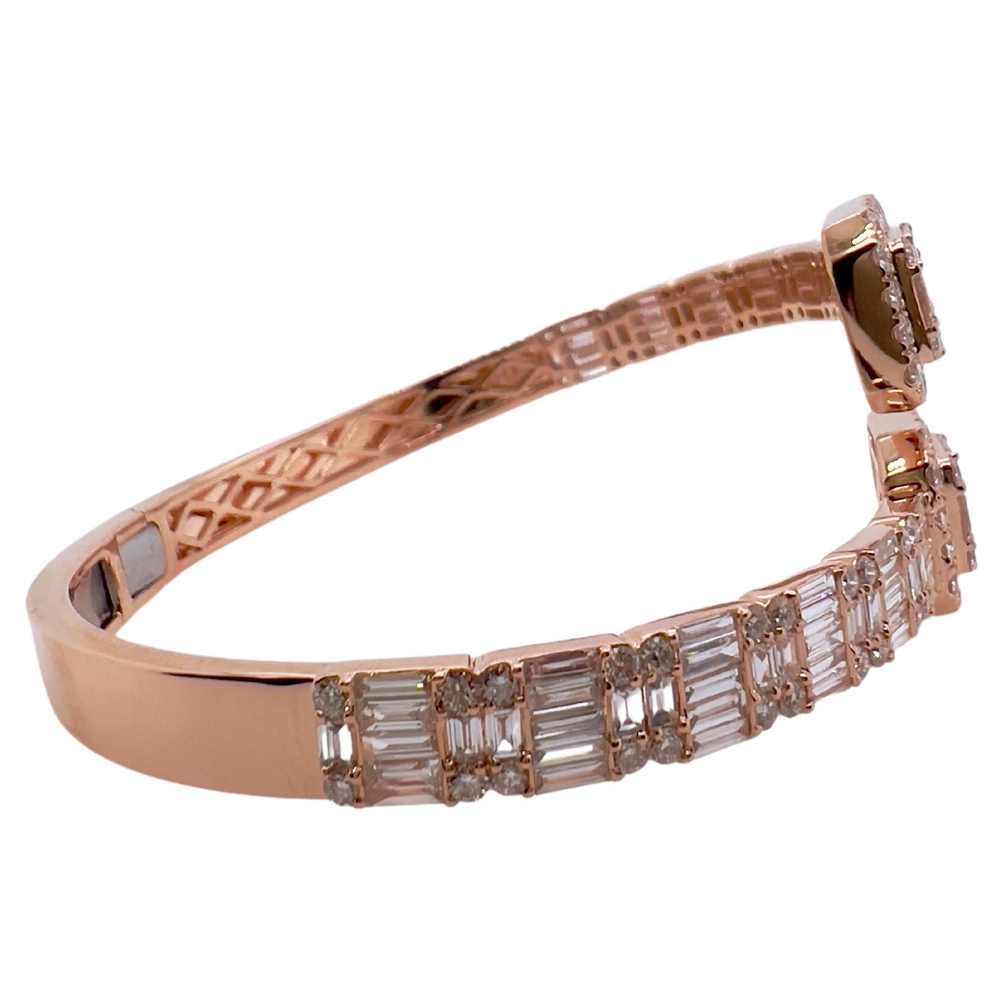 This stunning diamond bangle will definitely grasp everyone's attention.  The bypass style enables easy access on and off while delivering a contemporary design that will make your wrist glamorous!  

Diamonds:  5.99 cts, Baguettes & Round Brilliant