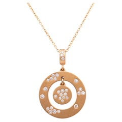 Pendentif circulaire en or rose 18k avec diamant