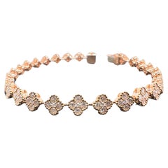 Bracelet tennis de style trèfle en or rose 18 carats avec diamants