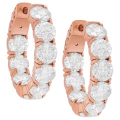 Boucles d'oreilles en or rose 18K avec diamants