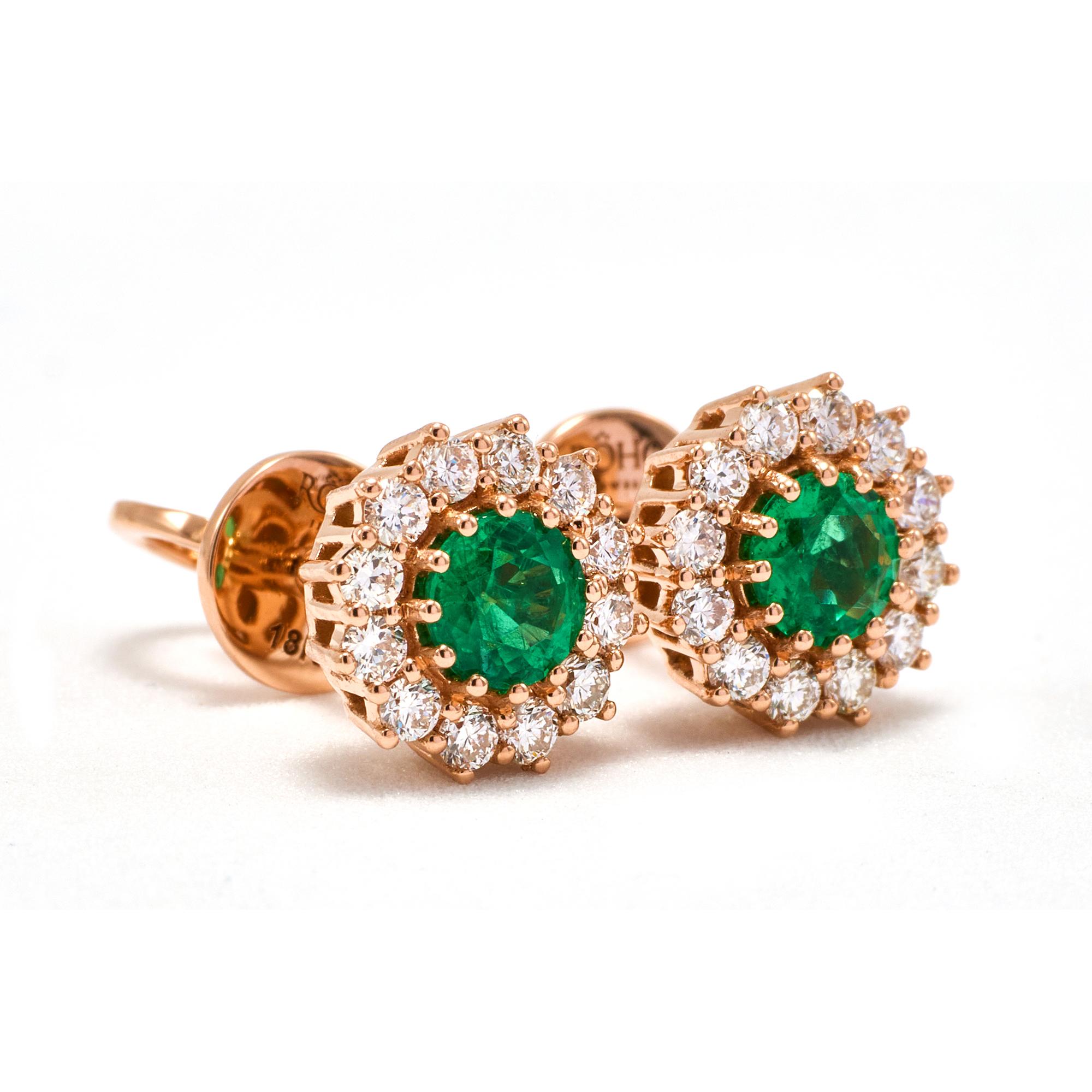 These 18k Rose Gold and Emerald Stud Earrings are a true masterpiece of fine jewelry craftsmanship. The natural, AAA quality Zambian emeralds are masterfully set in a classic, elegant solitaire design, surrounded by sparkling natural diamonds of the