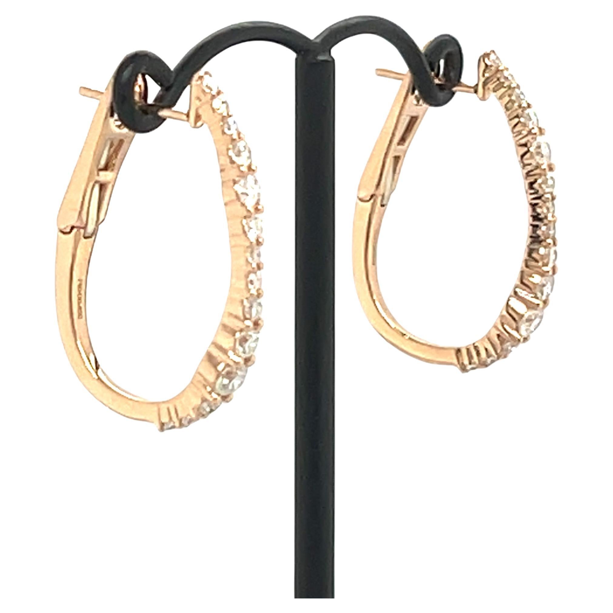 18K Rose Gold Diamond Hoop Earrings
This refined pair of hoop earrings is crafted entirely in 18K rose gold — a true symbol of femininity and sophistication. The delicately curved design is beautifully enhanced with a diamond setting that offers a