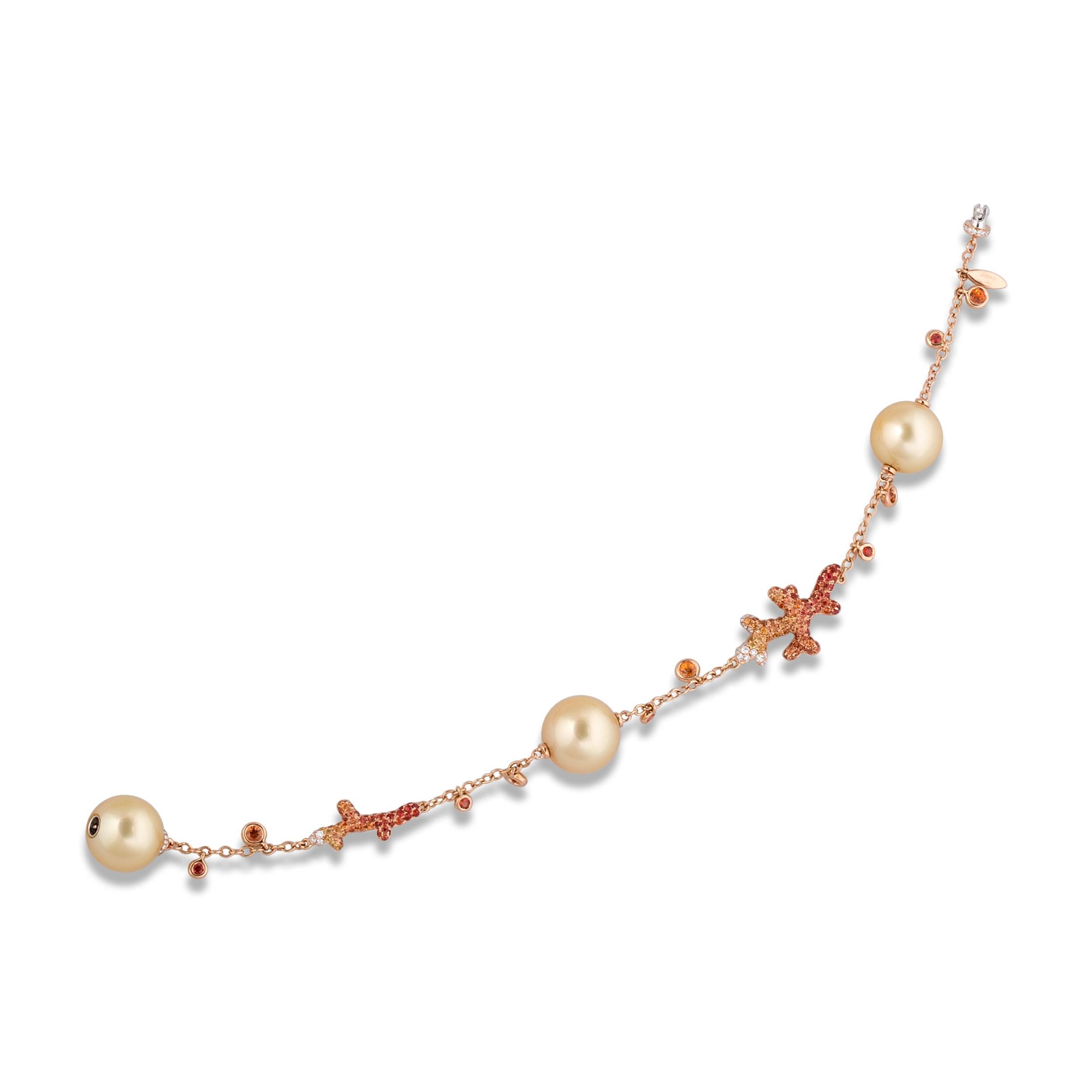 White Diamonds 0.17 cts - Yellow and Orange Sapphires 1.69 cts - Gold South Sea Pearls 3 pieces 11.75mm Coral Reef Bracelet, from Thalassa Collection, features shaded colour gemstones encrusted in delicate coral branches.

The bracelet is matching