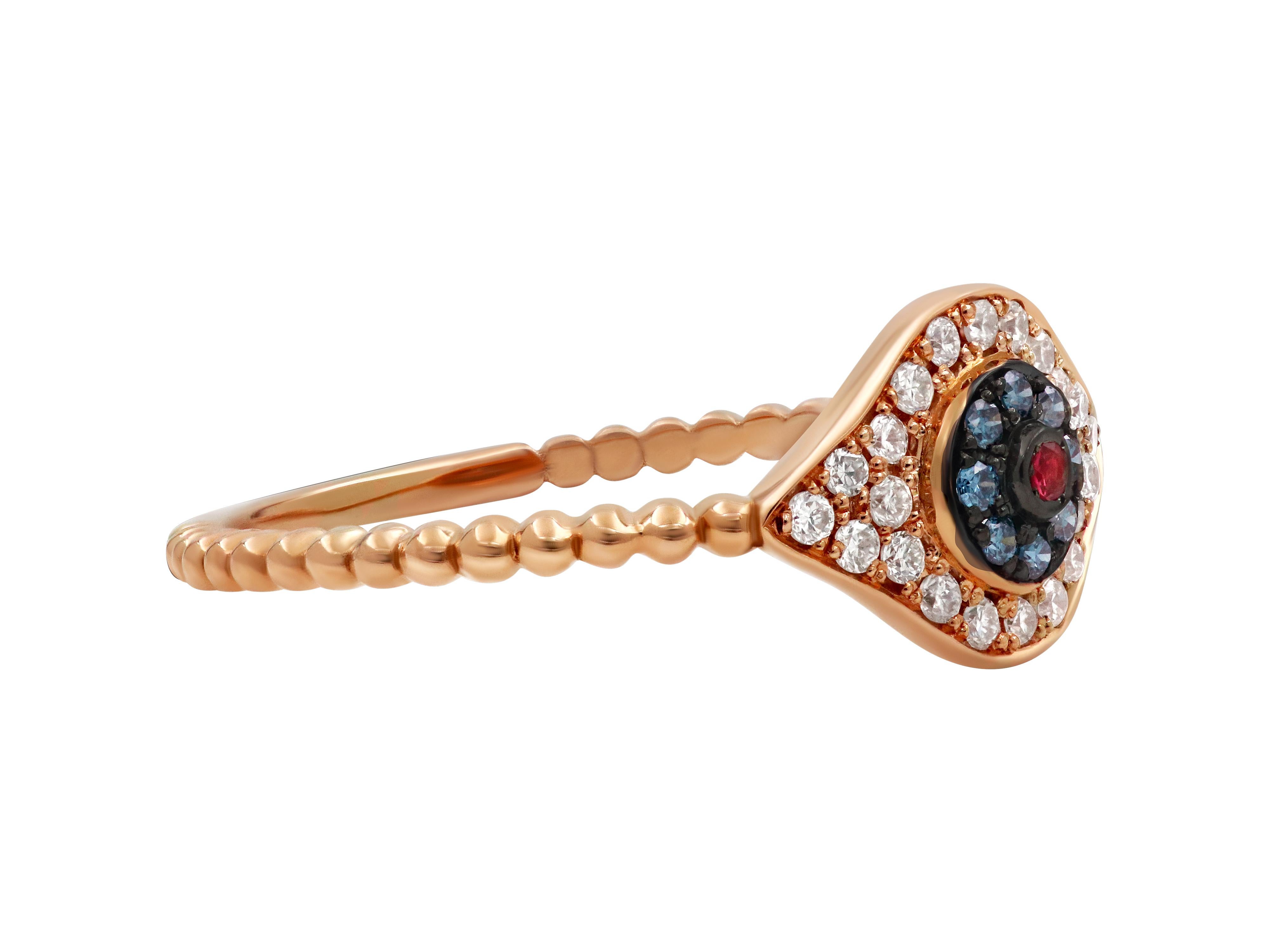 Dainty evil eye ring set in 18k rose gold with 0.01 carats ruby, 0.03 carats blue diamonds and 0.119 brilliant cut white diamonds.

Ring face: 0.314X0.393