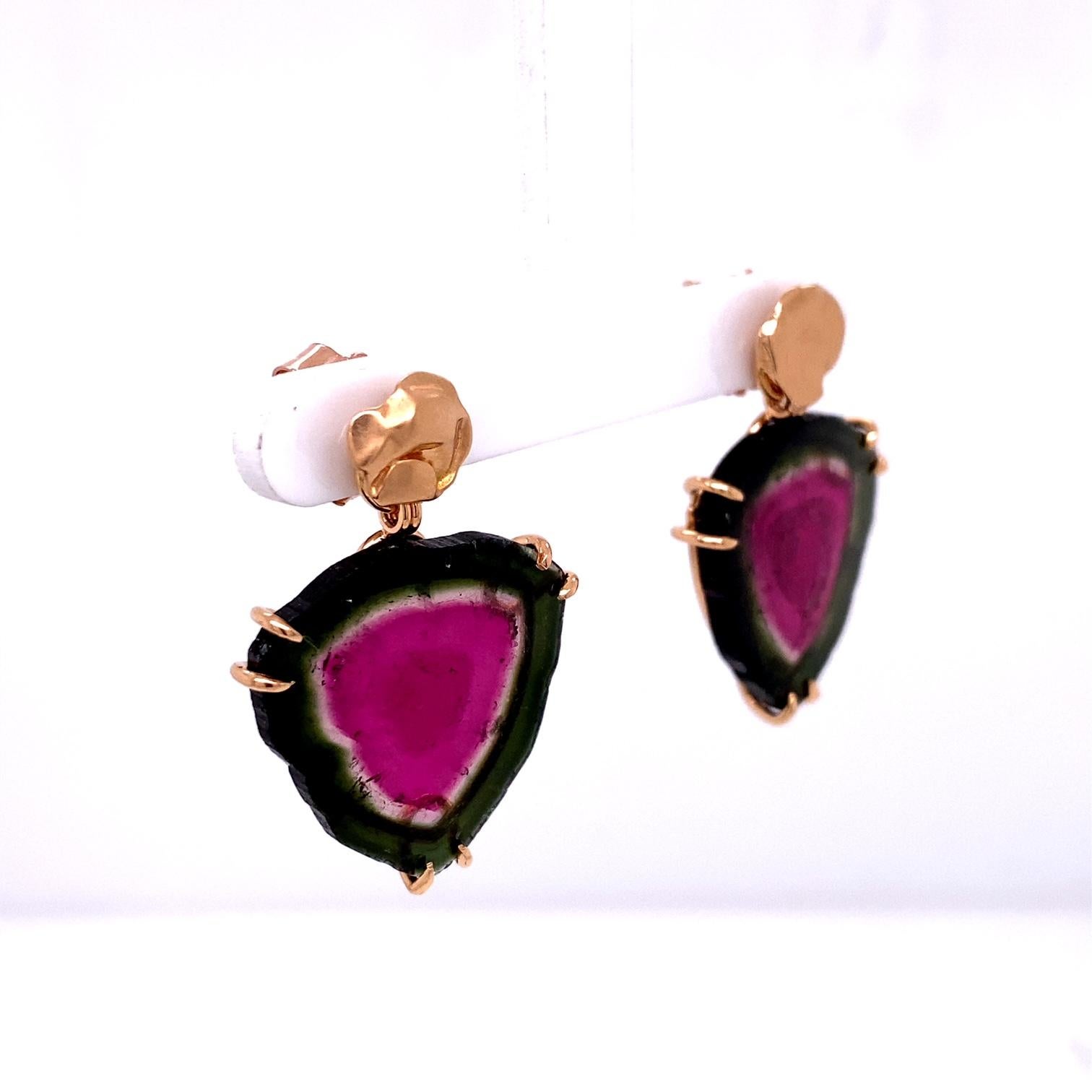 A pair of 18k rose gold freeform earring studs, with a pair of watermelon tourmaline earring jackets in 18k rose gold. These earrings were made and designed by llyn strong.
Items sold separately upon request.