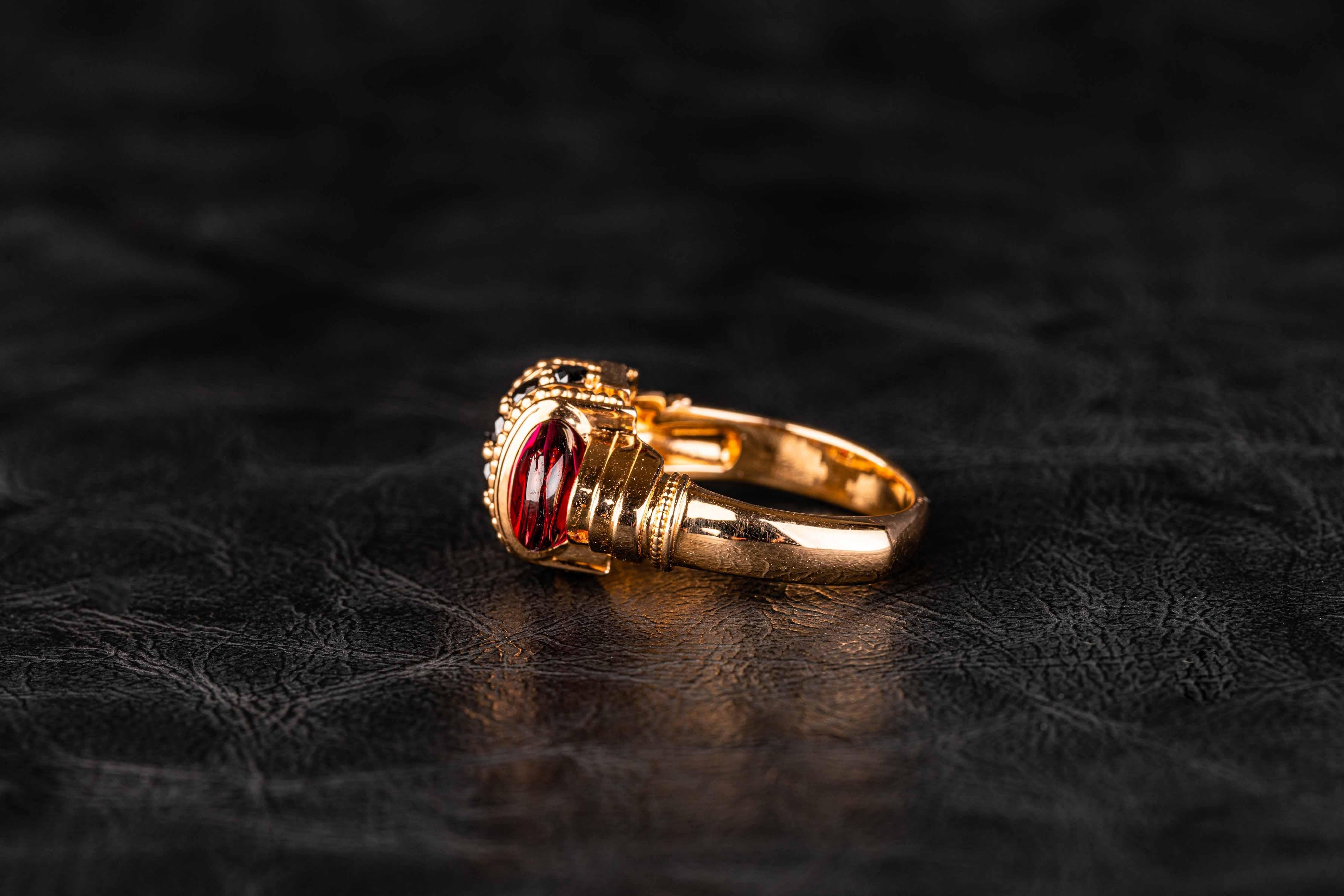 18 Karat Rose Gold Garnet and Black Diamond Ring In New Condition In Greenville, SC