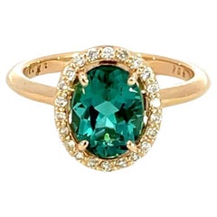 18k Rose Gold Green Tourmaline Ring with a Champagne Diamond Halo