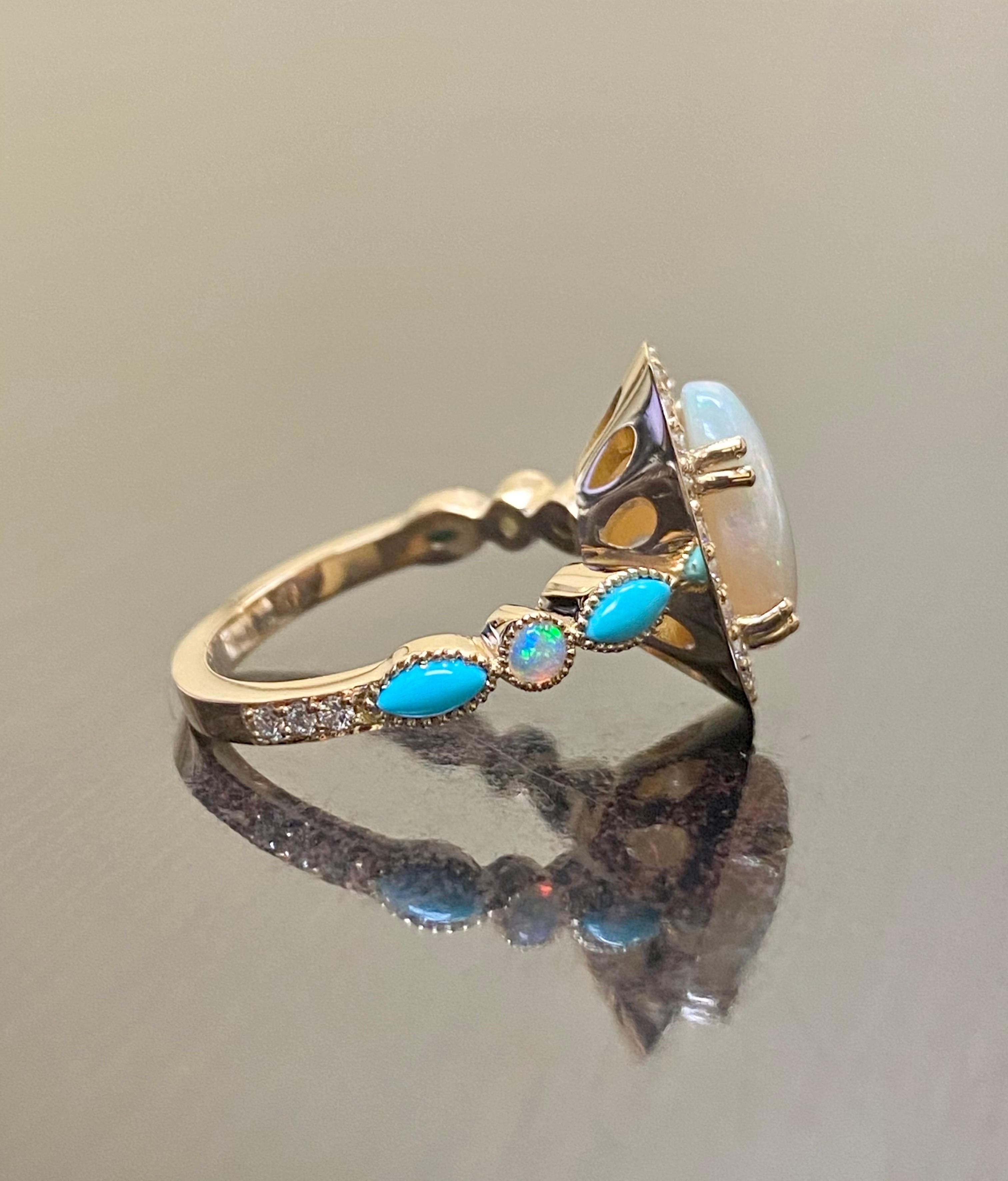 DeKara Designs Collection

Metal- 18K Rose Gold, .750.

Stones- Center Features an Oval Fiery Australian Opal Cabochon Cut 12 x 10 MM 2.20-2.50 Carats, Four Marquise Turquoise, Two Round Opals, 30 Round Diamonds F-G Color VS2 Clarity, 0.40