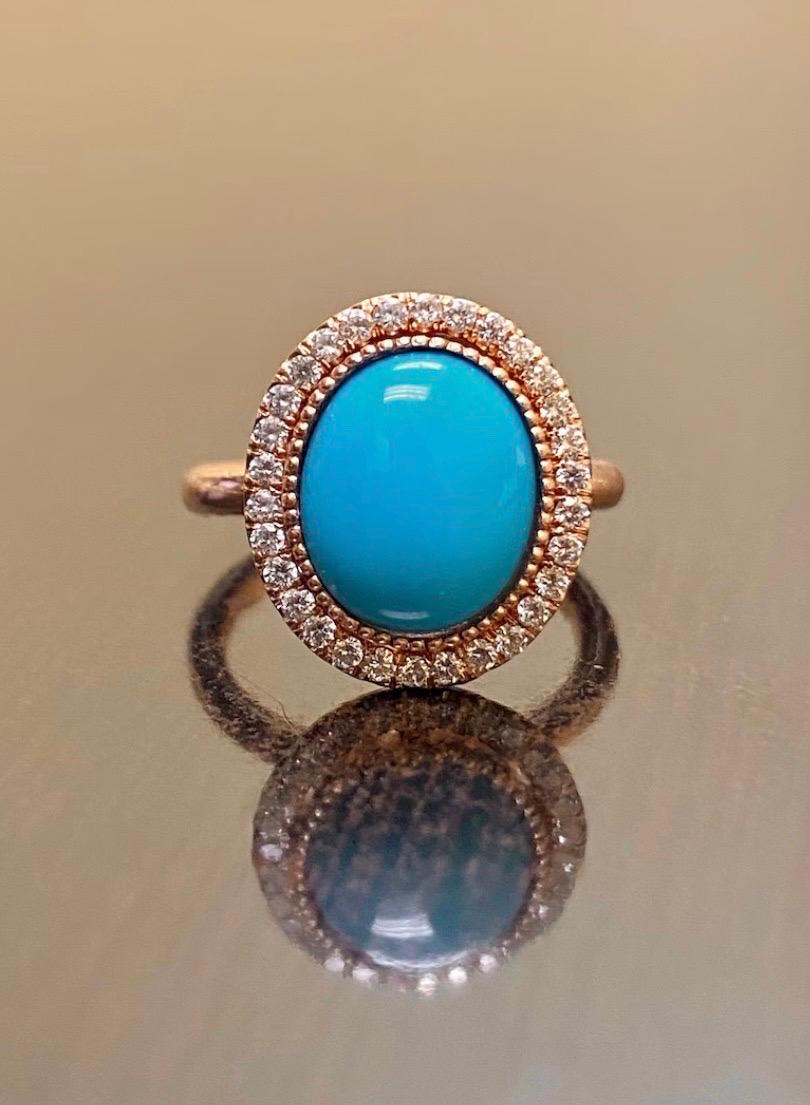 DeKara Designs Collection

Our latest design! An elegant Tiffany Blue Colored Oval Cabochon Natural Turquoise surrounded by beautiful diamonds in a halo setting.

Metal- 18K Rose Gold, .750.

Stones- Tiffany Blue Oval Cabochon Sleeping Beauty