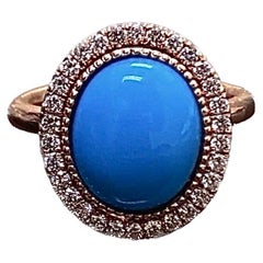 Bague de fiançailles en or rose 18 carats avec halo de diamants et turquoise Sleeping Beauty ovale
