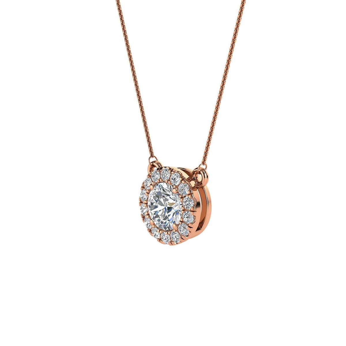 This delicate pendant feature one round shaped diamond that is approximately 0.35-carat total weight (4.5 mm) encircled by a halo of perfectly matched 14 brilliant round diamonds in about 0.14-carat total weight. The earrings are measuring at 7.5 mm