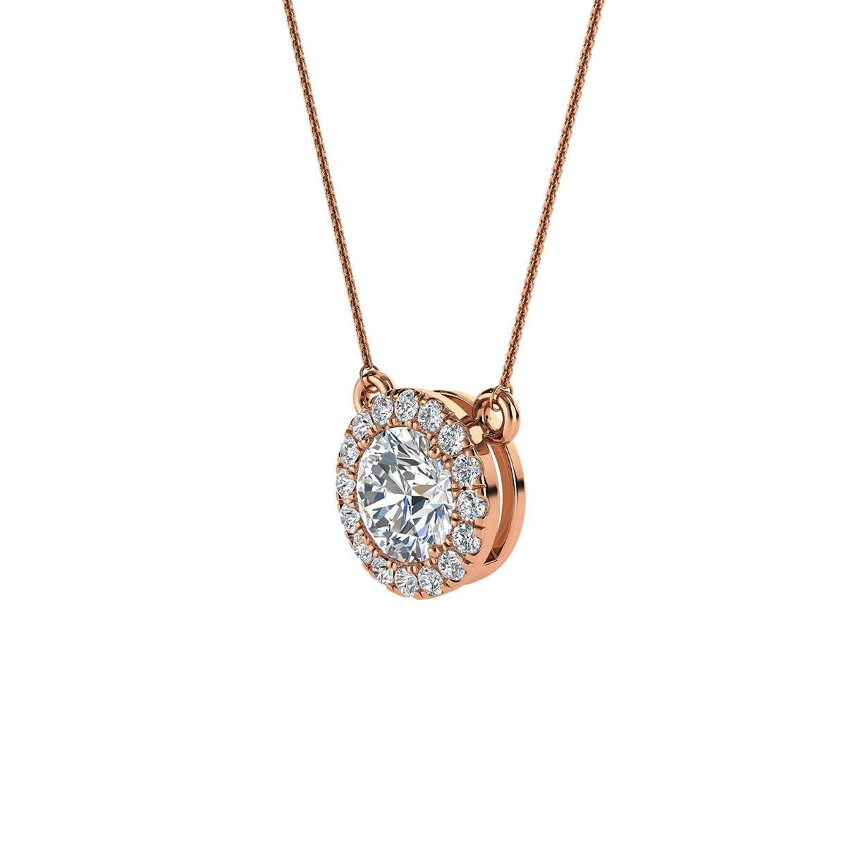 This delicate pendant features one round shaped diamonds that are approximately 0.54-carat total weight (5.2 mm) encircled by a halo of perfectly matched 16 brilliant round diamonds in about 0.17-carat total weight. The earrings are measuring at 8.6