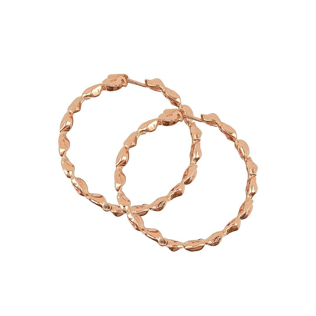 Sarab Collection Hoop Earrings takes its shape from the patterns and marking of the desert. Interlacing the finest round cut diamonds and rose gold nuggets to create an echo of the many stories of resilient women of the desert.

-	Weight: 42.64