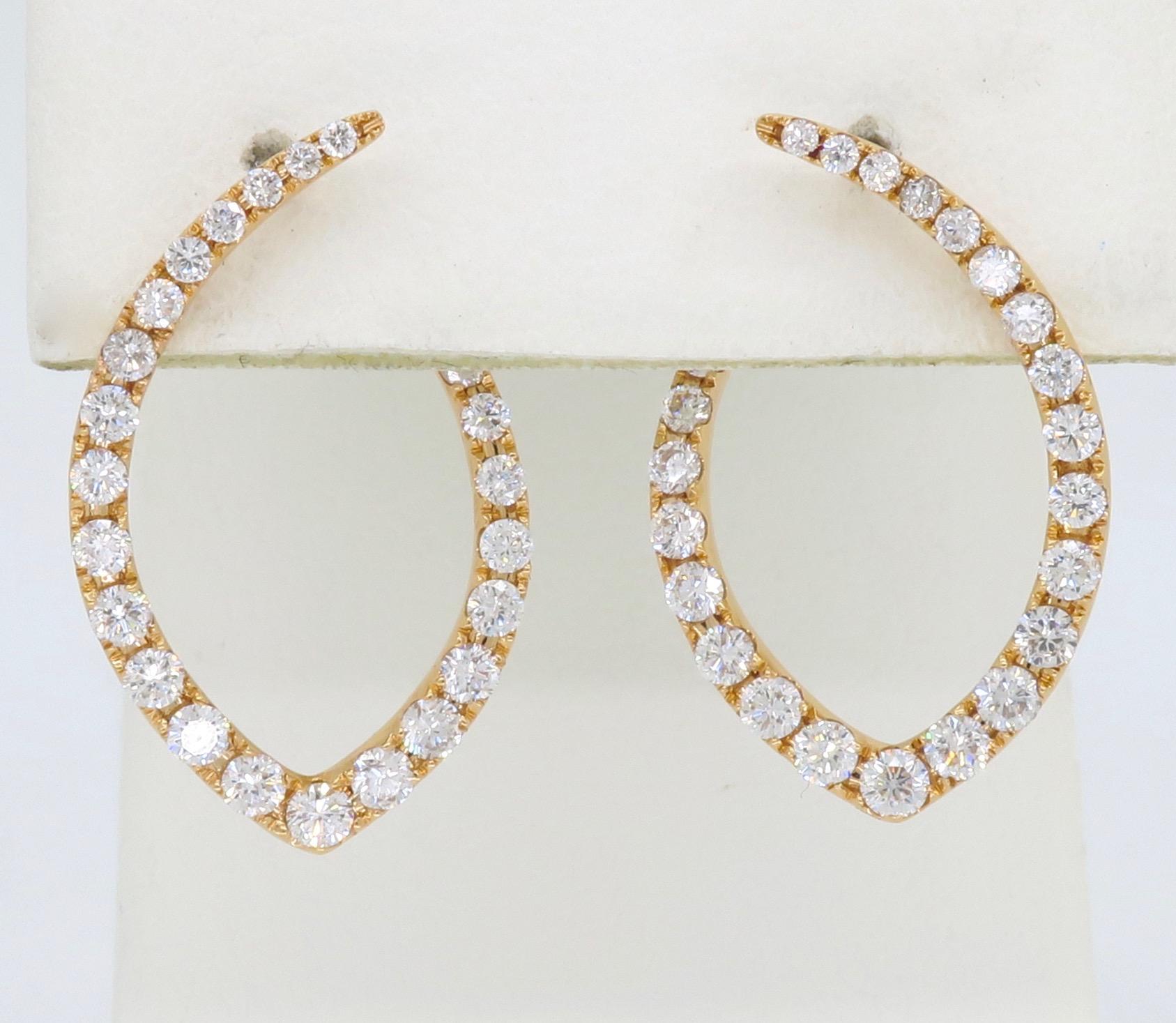 These elegant 18K rose gold earrings are uniquely shaped and feature 48 Round Brilliant Cut Diamonds.

Diamond Carat Weight: Approximately 1.09CTW 
Diamond Cut: 48 Round Brilliant Cut Diamonds
Color: Average G-I
Clarity: Average VS-SI
Metal: 18K
